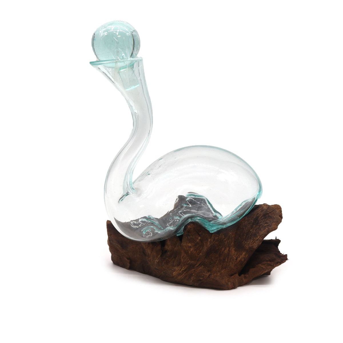 Molten Glass on Wood, Wine Decanter with clear curved glass body and stopper on a dark wood base, front view