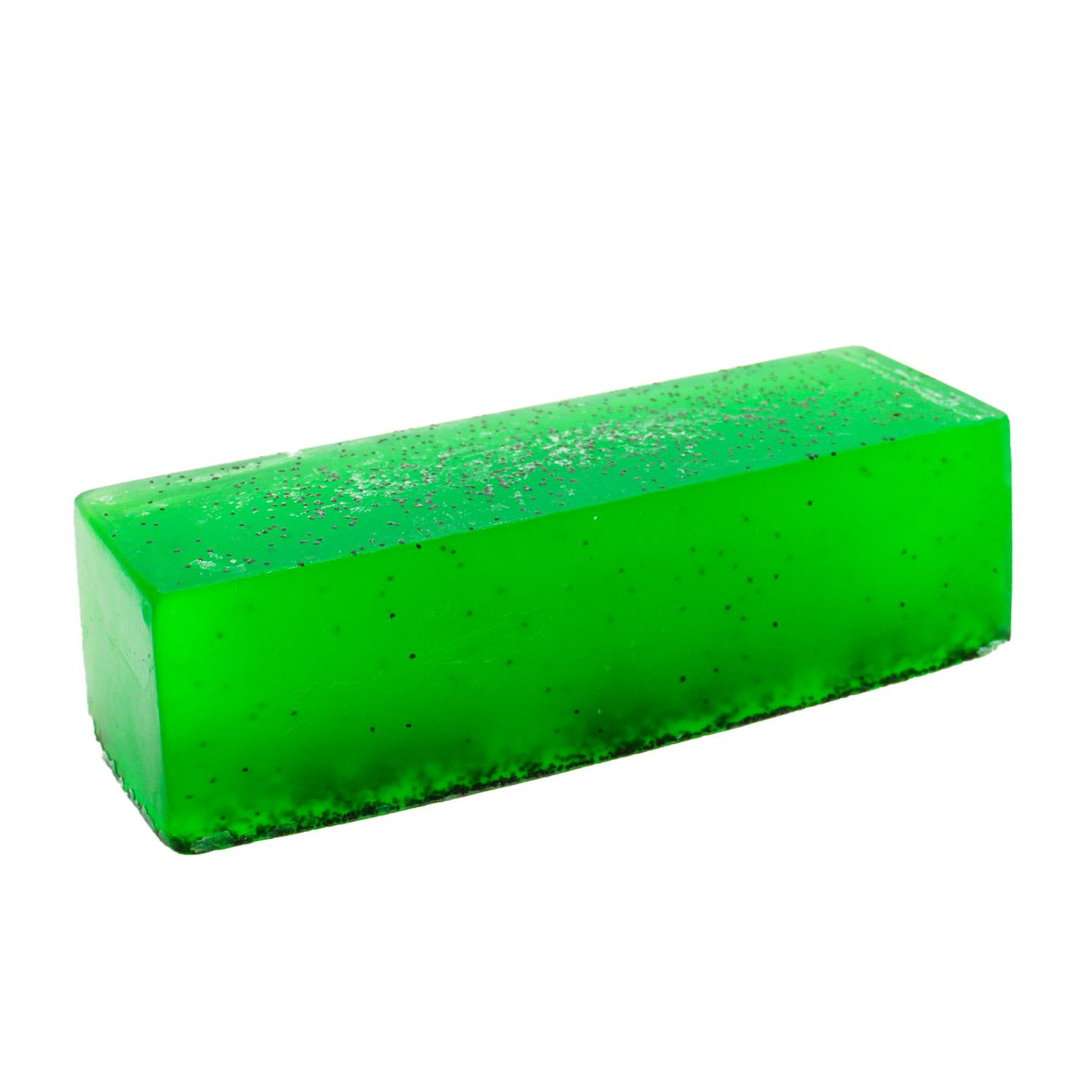 Tea Tree & Fresh Mint soap loaf, close-up of a solid green speckled bar against white