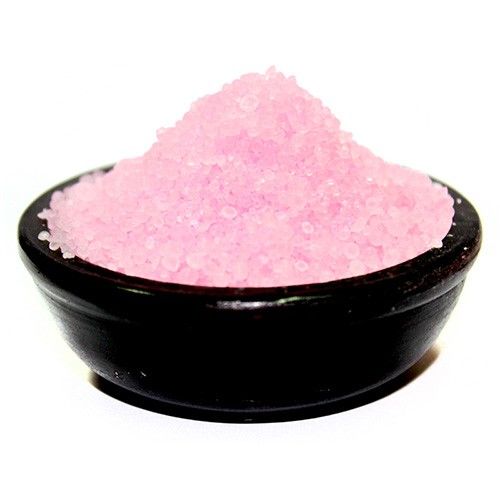 Bedroom, Midnight Roses simmering granules, pink granules piled in a black bowl against a white background