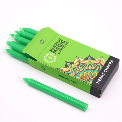 Green heart chakra candles in their box with one candle beside them