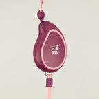 Side view of the plum casing and pink tape