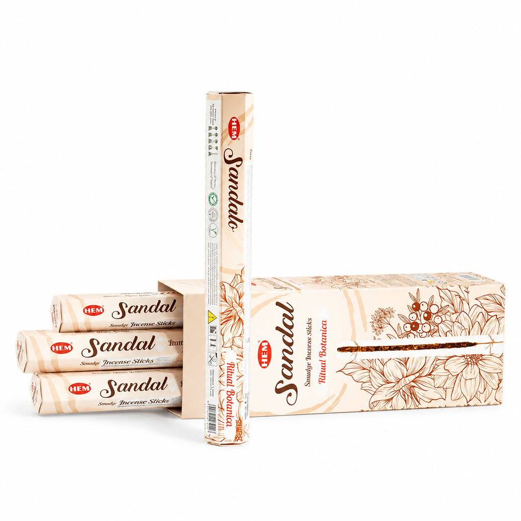 HEM Sandal incense pack with incense sticks shown beside it