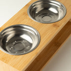 Close-up of both bowls set into the wooden stand