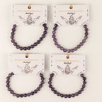 Four amethyst bracelets displayed on illustrated cards