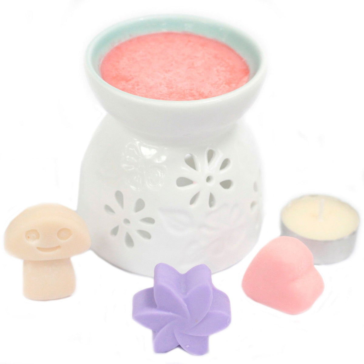 Box of 6 Wax Melts, Dark Patchouli beside a white cut-out burner, with pink, purple and cream melts