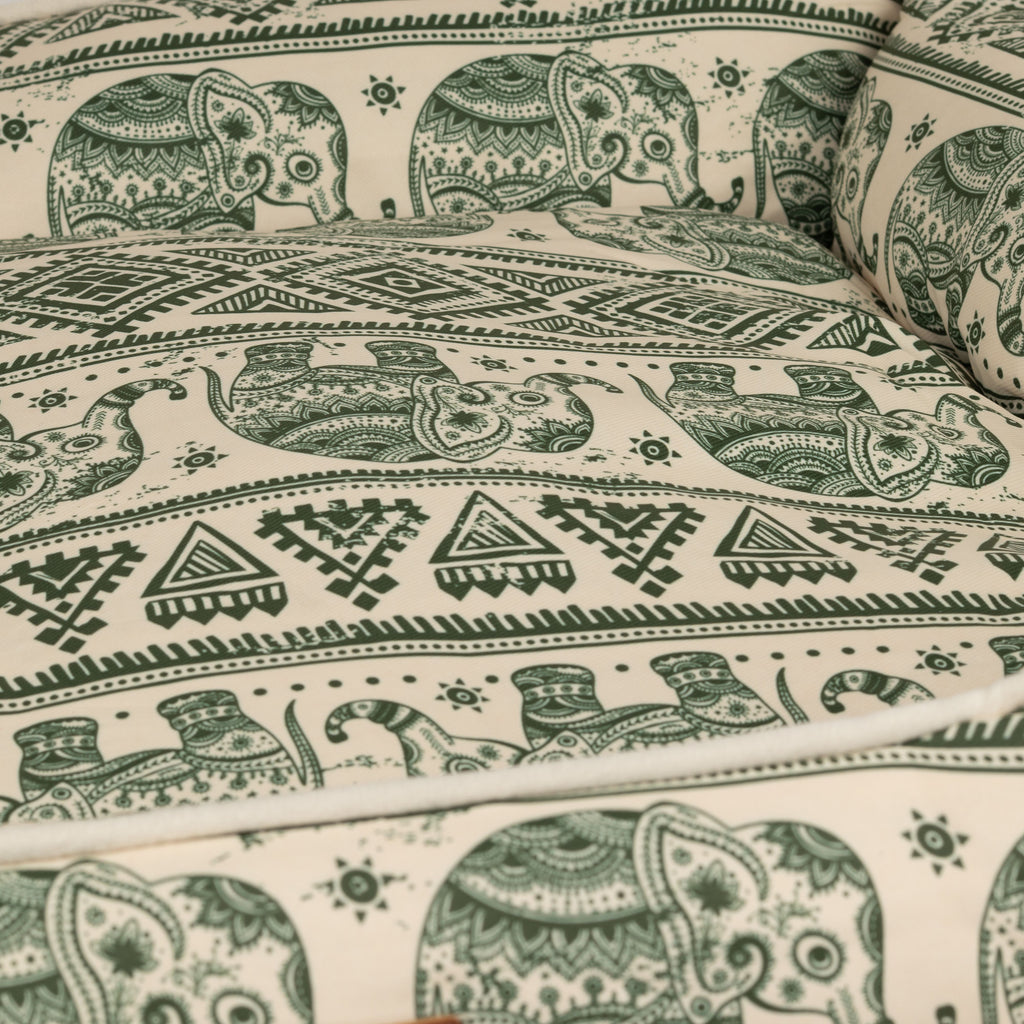 Close-up of the bed's patterned padded sleeping area