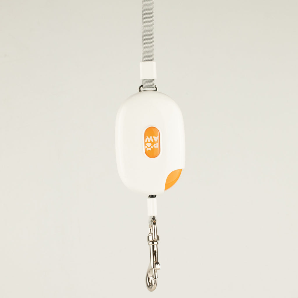 Paw Pocket Pod white retractable lead with orange detail, strap and metal clip