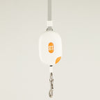 Paw Pocket Pod white retractable lead with orange detail, strap and metal clip