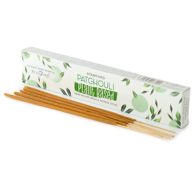 Plant Based Masala Incense Sticks, Patchouli in a leafy white box beside several brown incense sticks