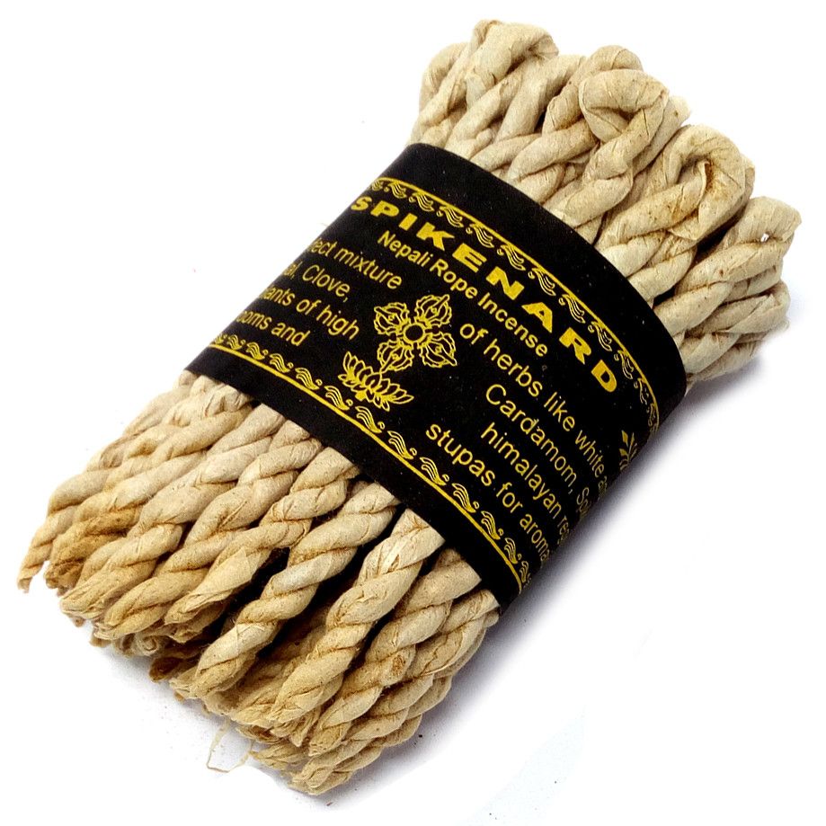 Close-up of the beige Spikenard rope incense bundle and its black and gold label