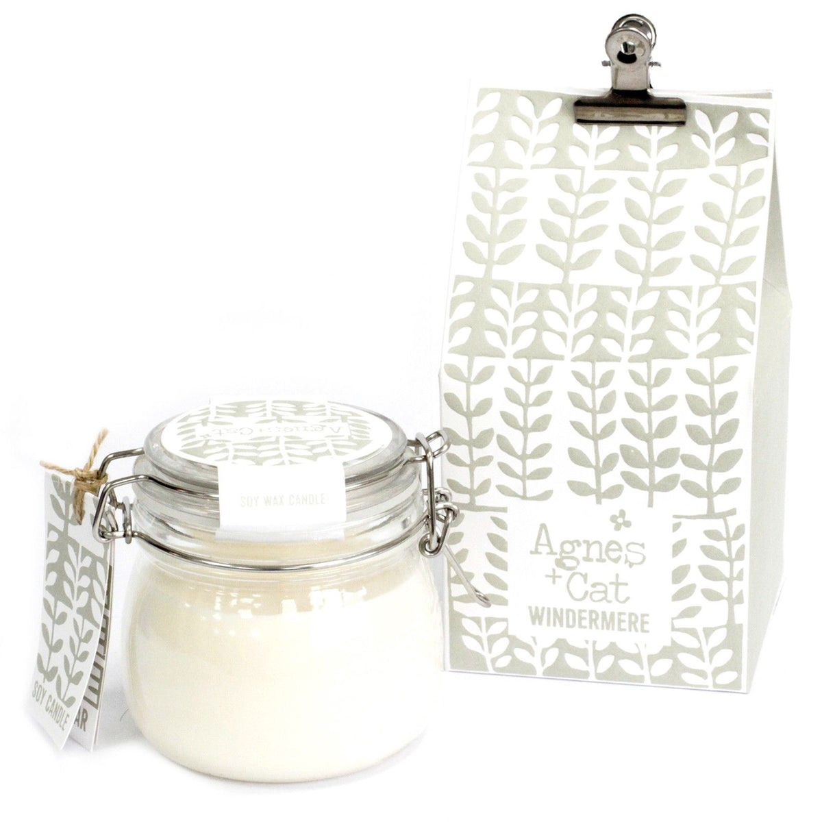 Agnes + Cat Kilner Jar Candle, Windermere, a clear glass jar with white wax beside its patterned box