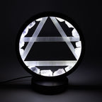 Air lamp illuminated against a dark background