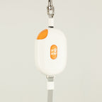 Front view of the white Pocket Pod casing with orange detail