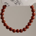 Carnelian bracelet arranged in a circle to show the bead pattern