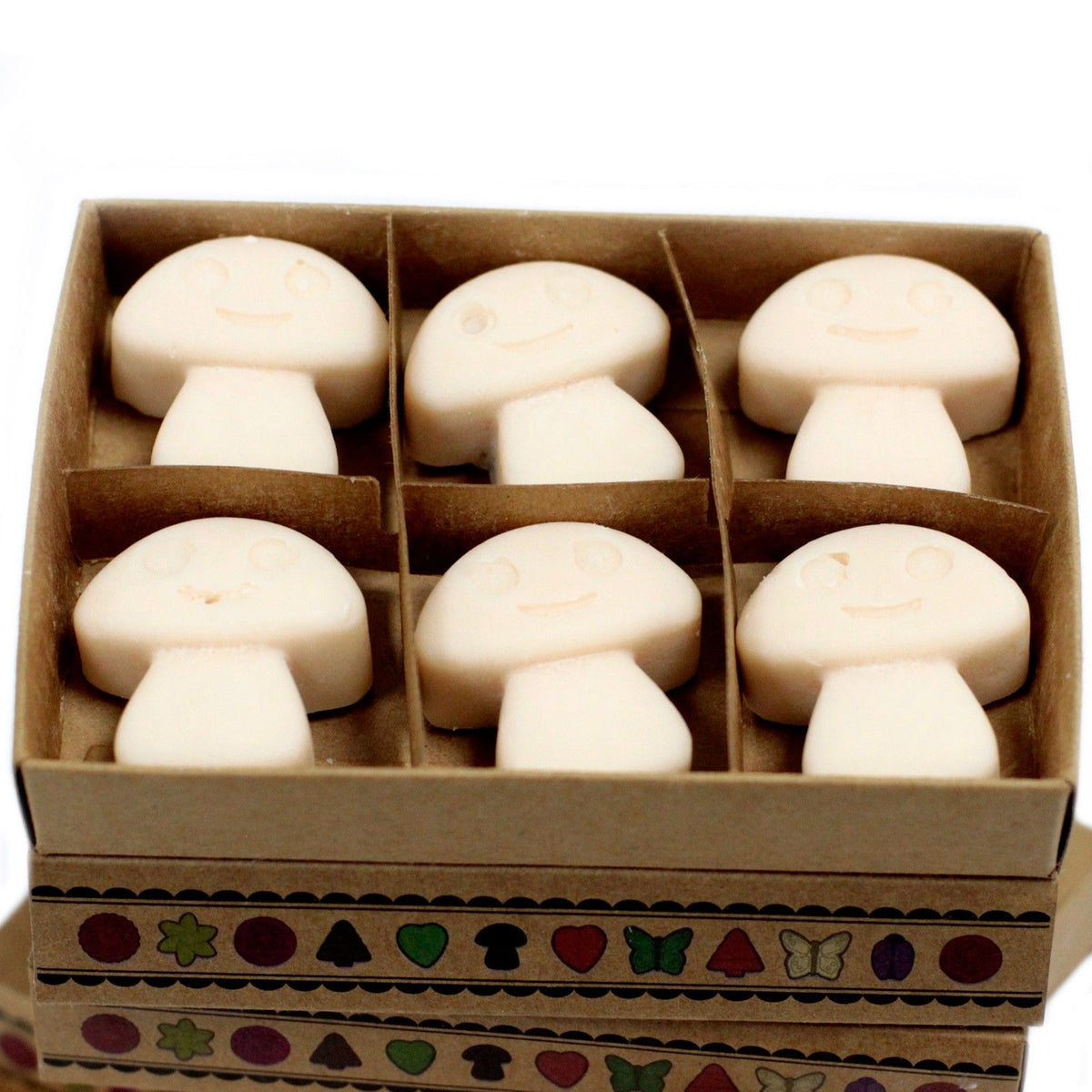 Box of 6 Wax Melts, Vanilla Nutmeg, six cream mushroom-shaped melts in an open divided box