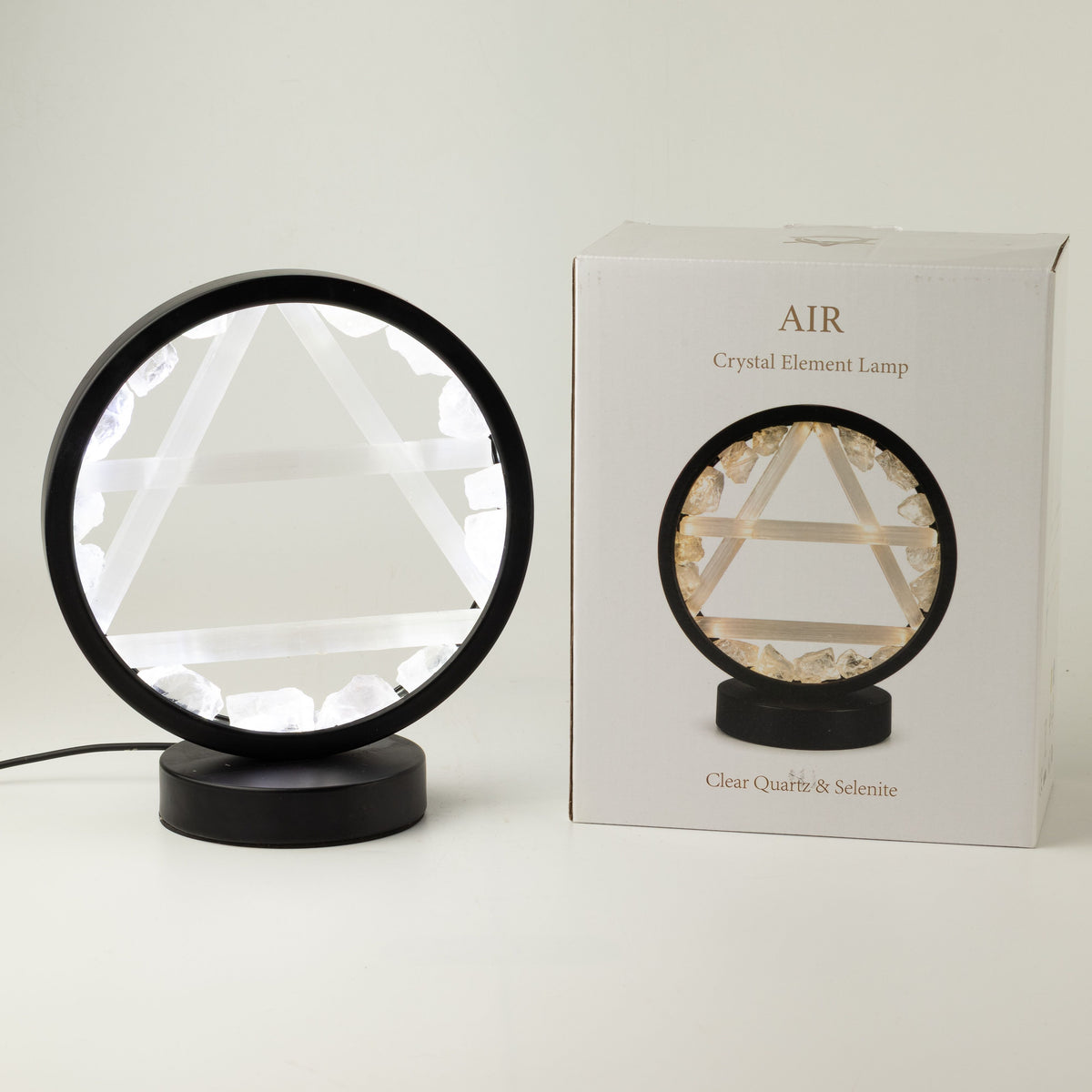 Lamp beside its box showing the Air symbol