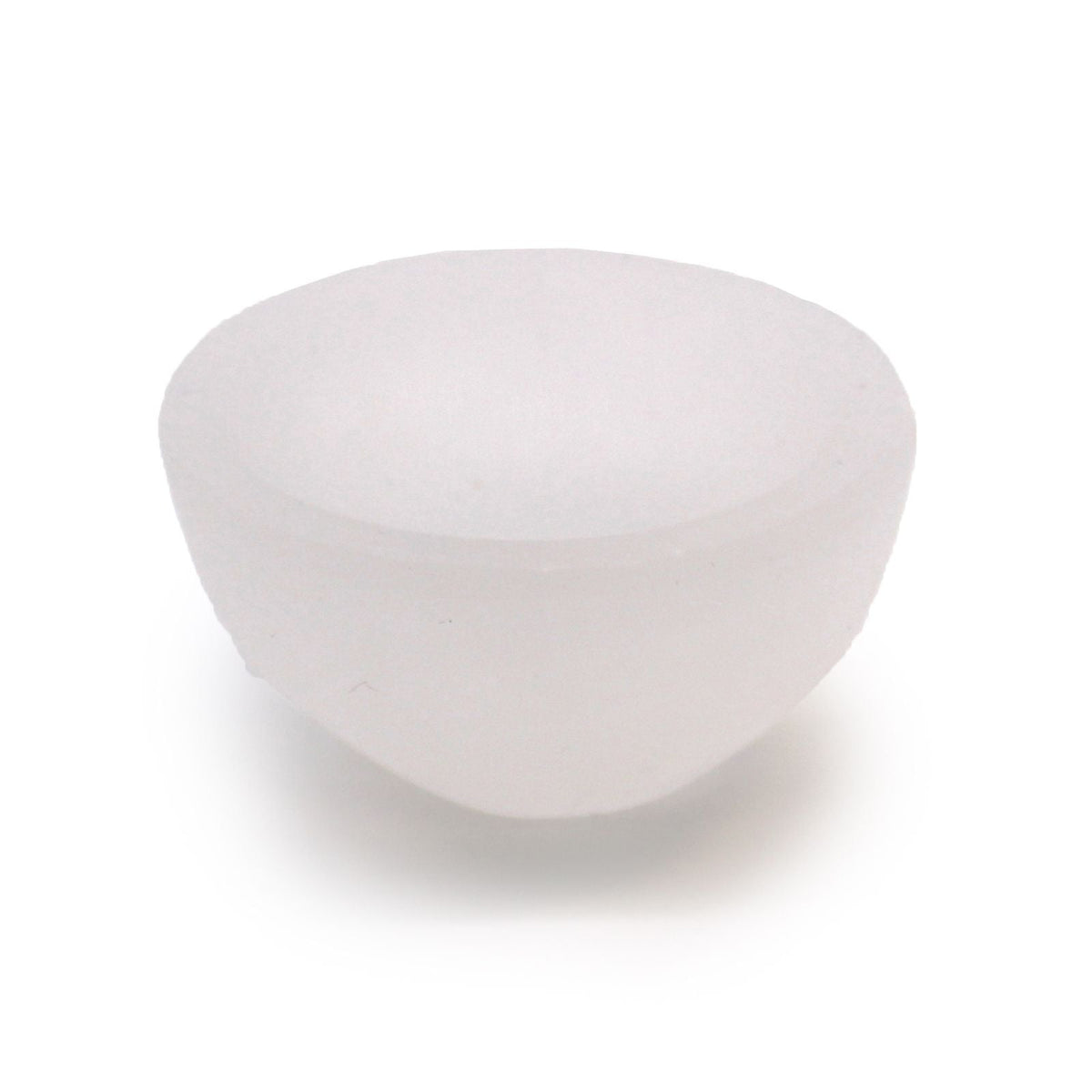 Selenite bowl shown from the side against a white background, with its rounded base visible