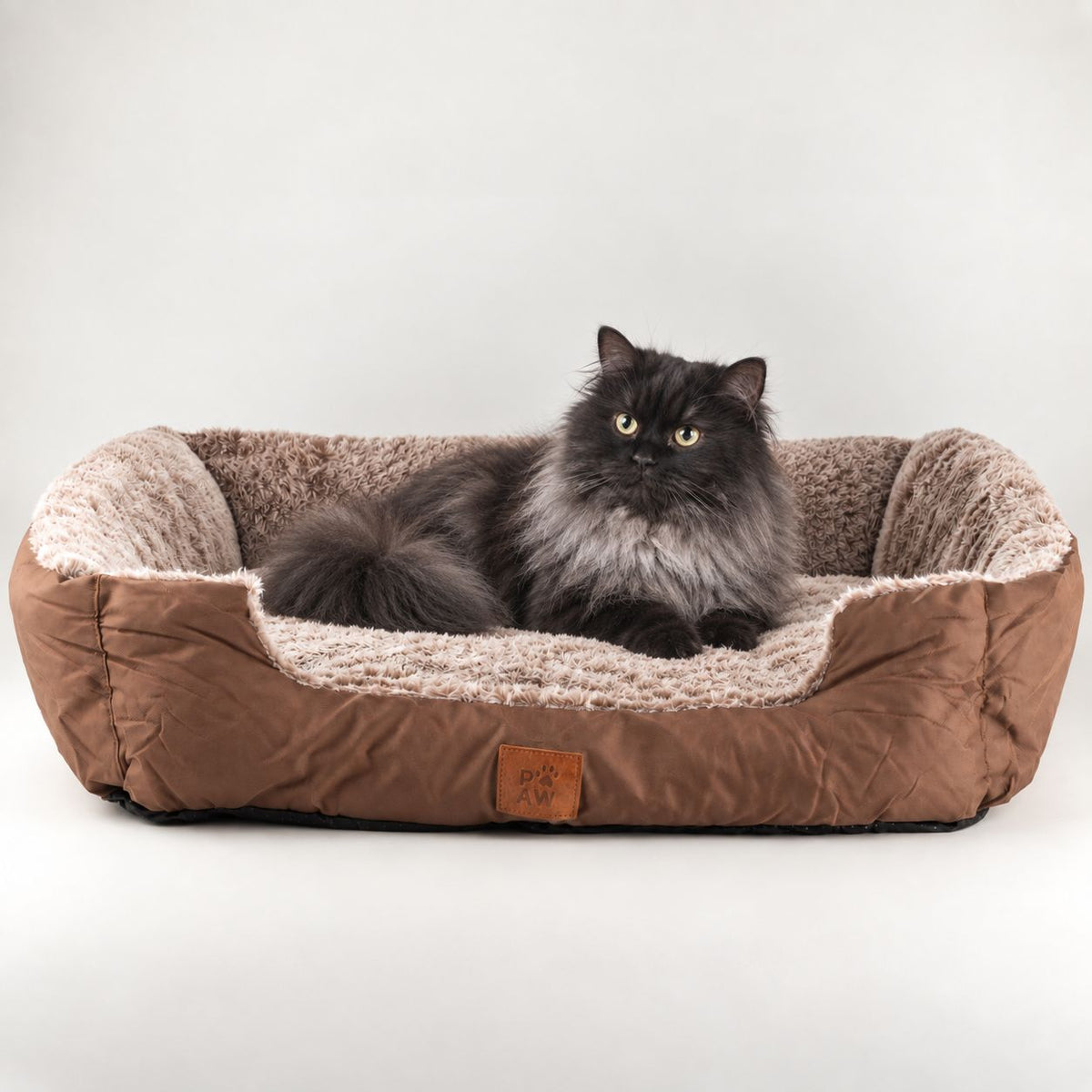 PAW teddy-brown pet bed with a cat sitting inside