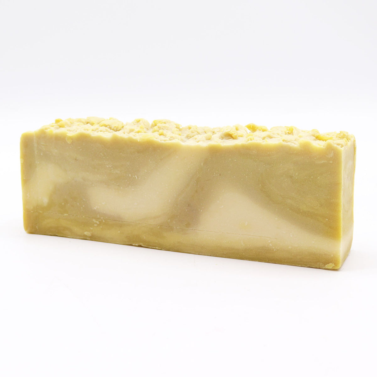 Argan, Olive Oil Soap Loaf, single pale yellow bar shown from the front on a white background