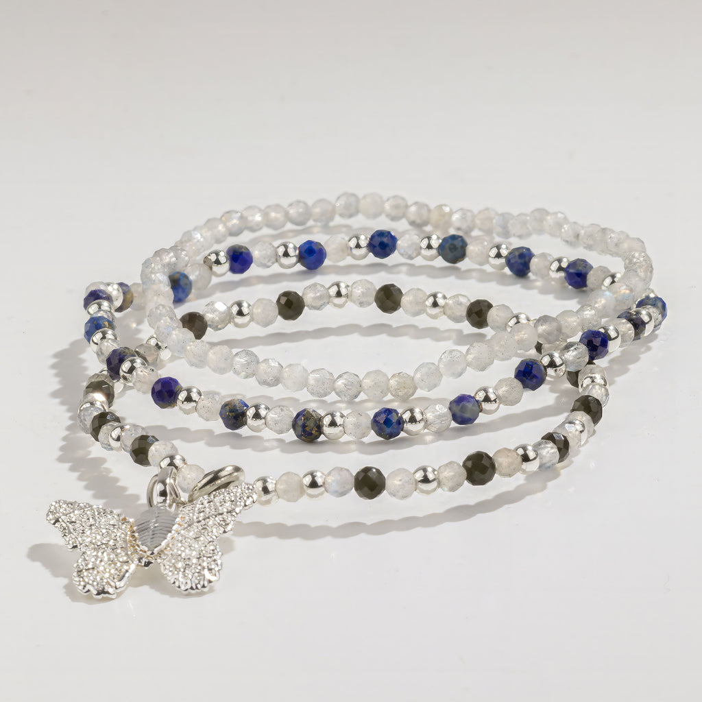 Three coordinated beaded bracelets arranged together
