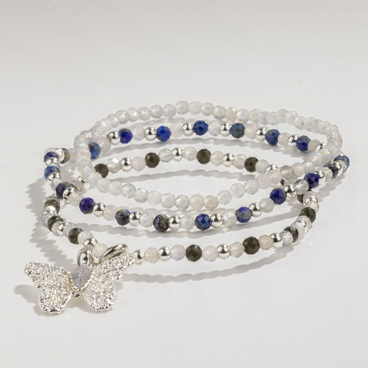 Three coordinated beaded bracelets arranged together