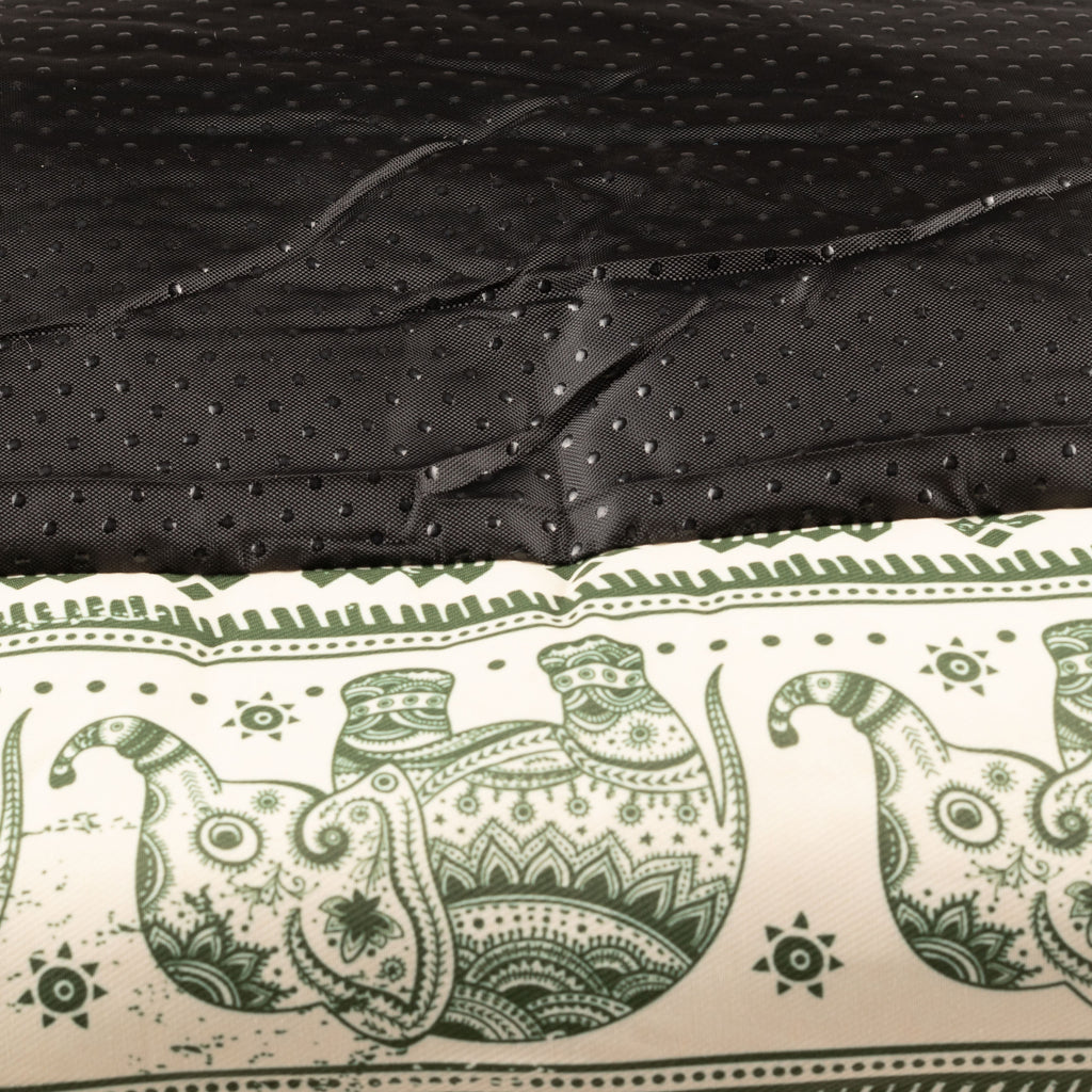 Textured black base of the green pet bed