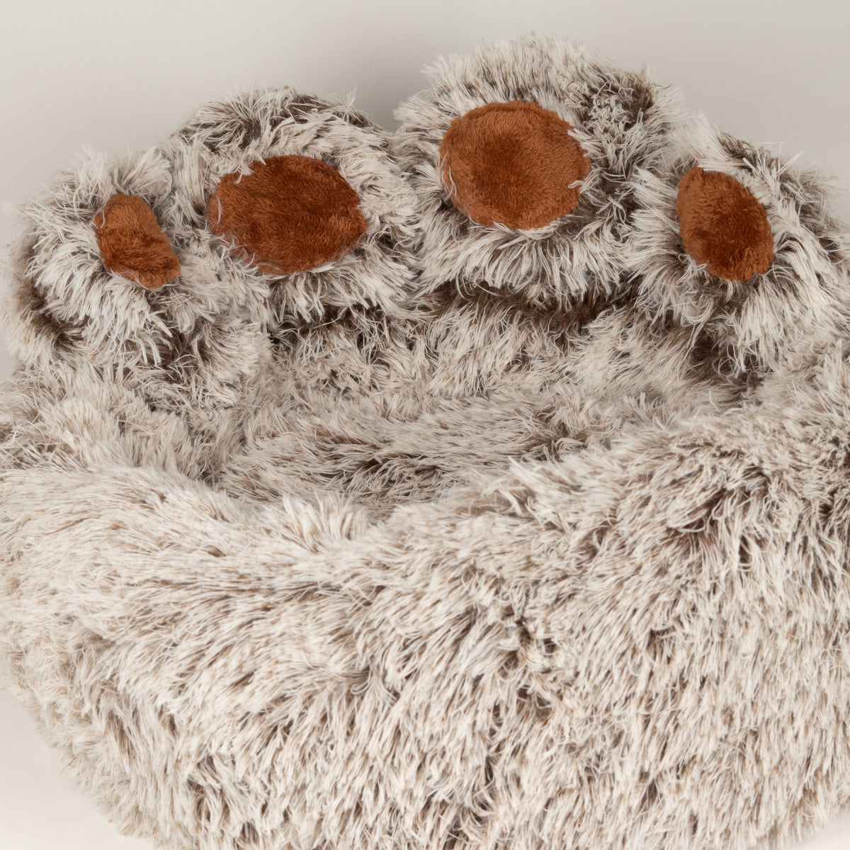 View into the plush centre of the paw-shaped bed