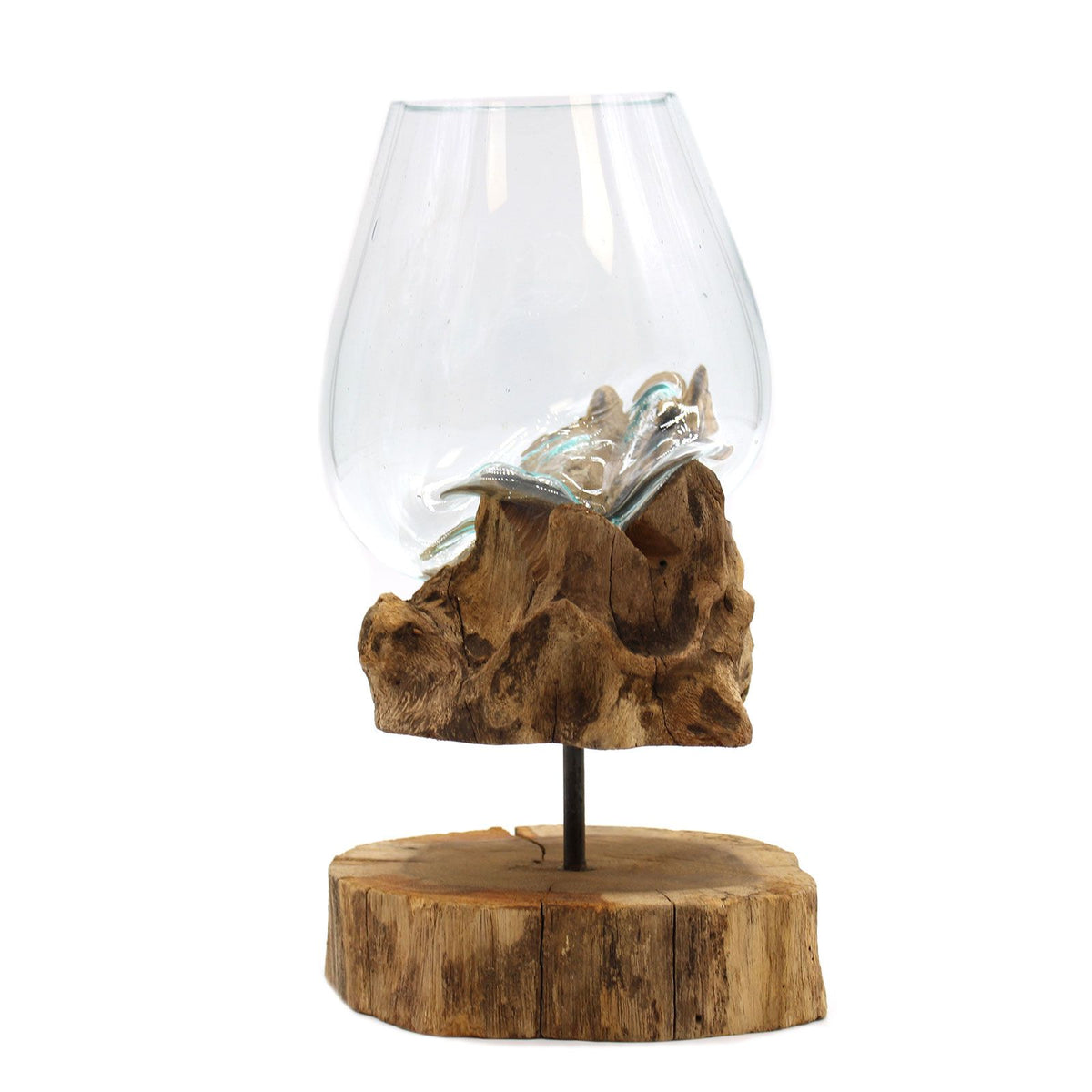 Empty clear glass bowl and sculptural wood support on a round base, isolated against a plain background