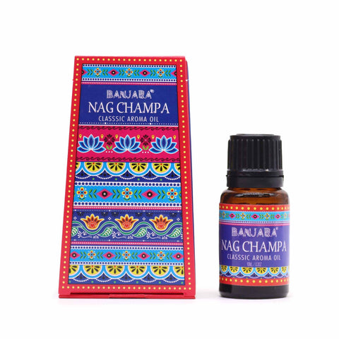 Nag Champa fragrance oil bottle beside its upright red and blue patterned box, front view
