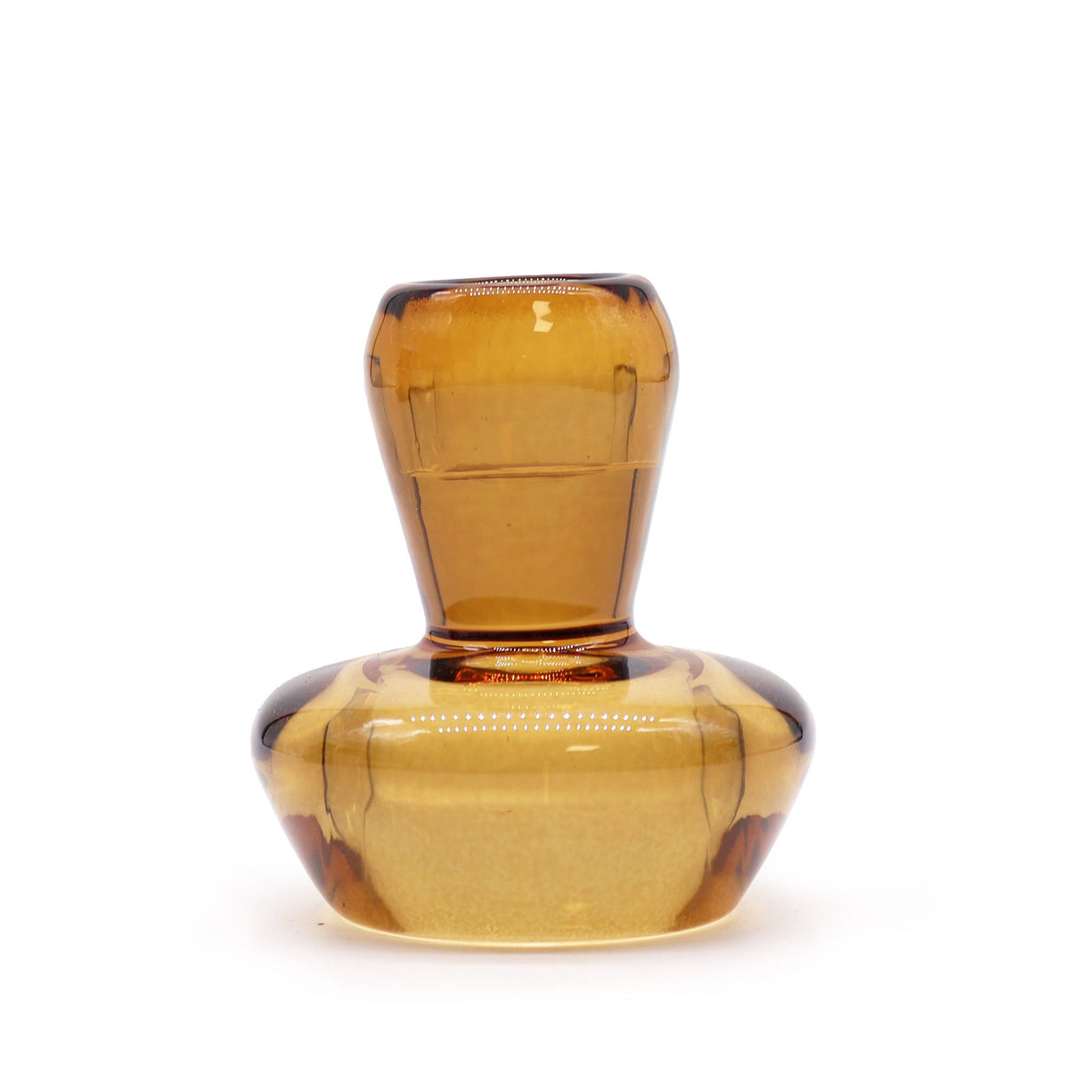 Antique amber mushroom holder shown close up on its own, with the candle opening visible