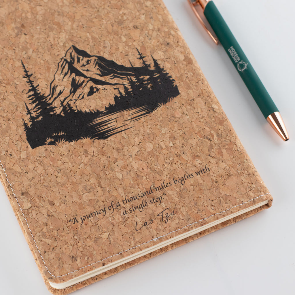 Back cover with a mountain illustration and printed wording