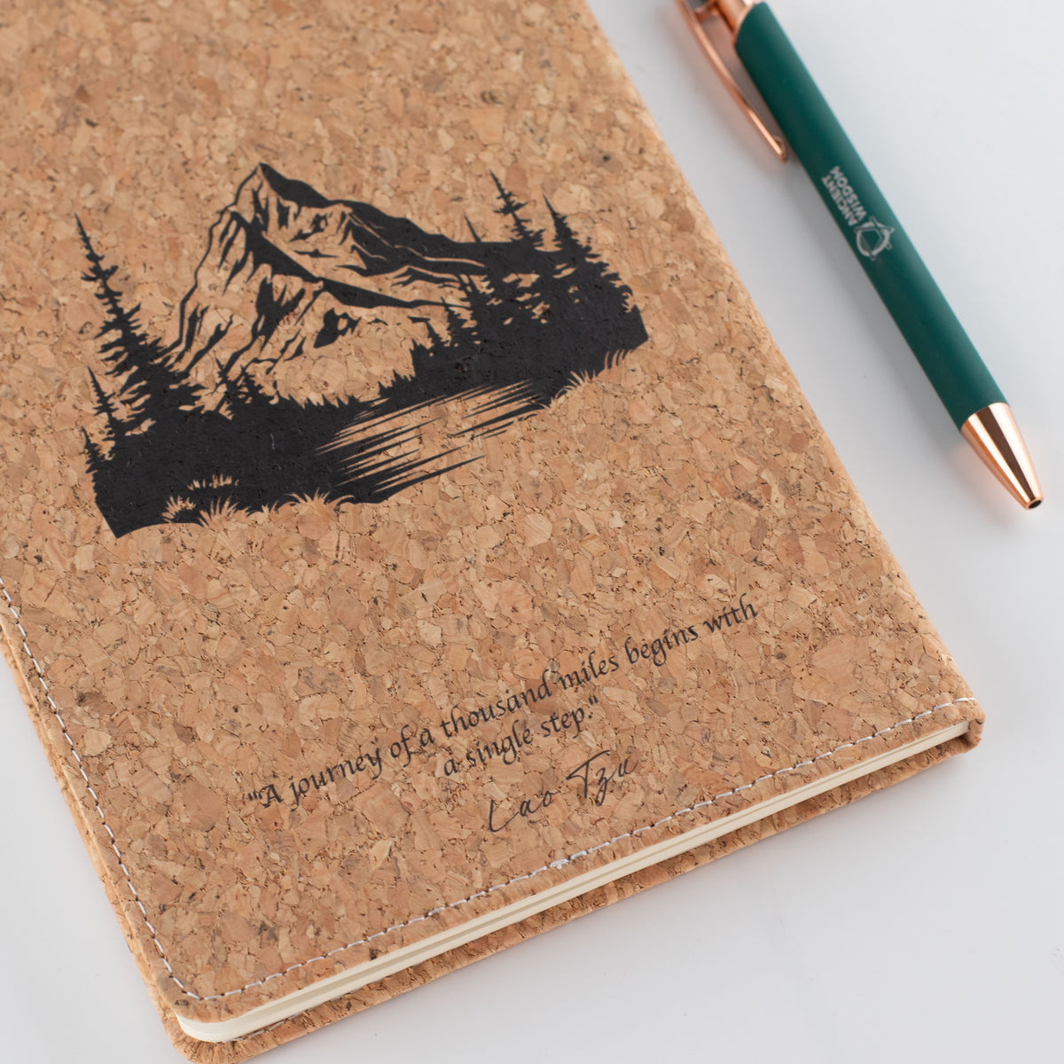Back cover with a mountain illustration and printed wording