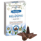 A box of Relaxing backflow incense cones with loose cones beside it.