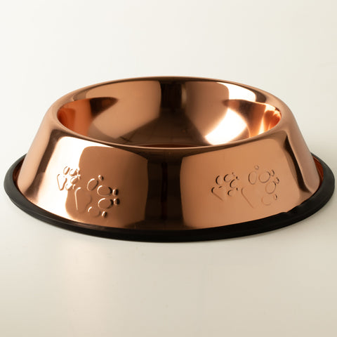 Copper-style pet bowl with embossed paw prints and black edge