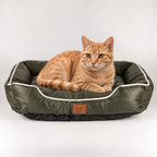 Khaki-green pet bed with a cat resting inside
