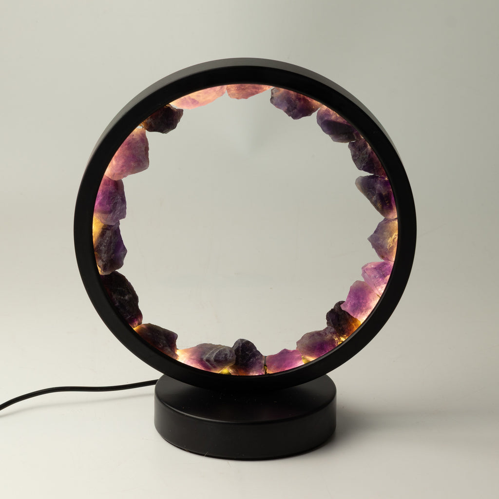 Zen Spirit amethyst halo lamp lit, showing the circular ring of purple stones