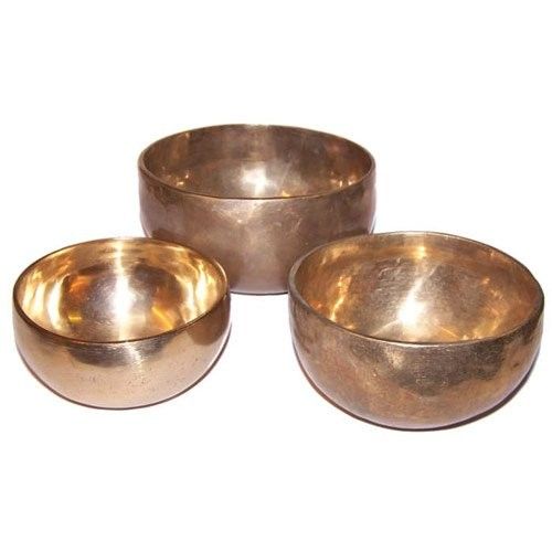 Set of 3 Handmade Brass Singing Bowls, three golden-brown bowls shown open on a plain white background