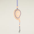 Paw Mini Mango peach retractable lead with lavender trim and wrist strap