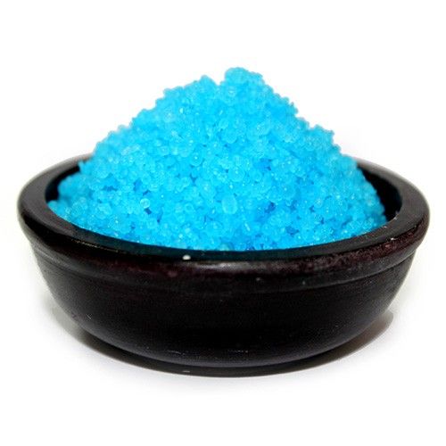 Bathroom, Fresh Cotton simmering granules, bright blue crystals heaped in a dark bowl against white