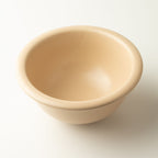 Close view inside the warm cream bowl