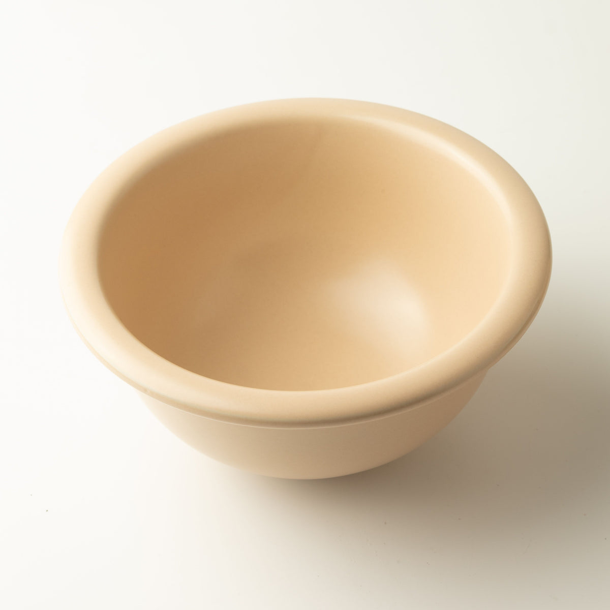 Close view inside the warm cream bowl
