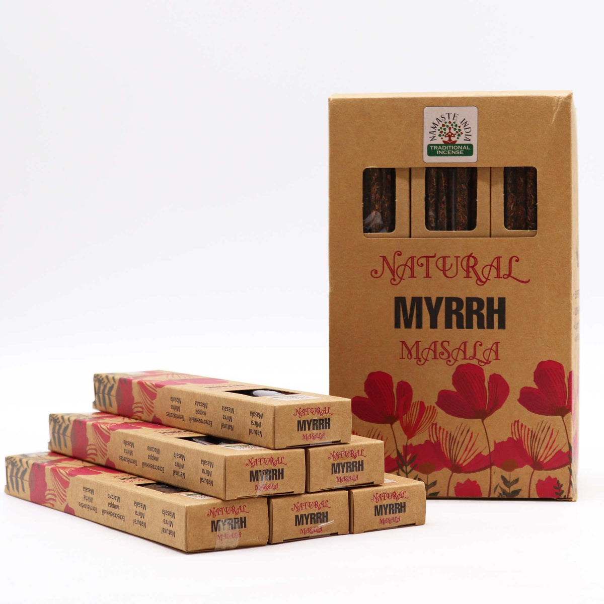 Natural Botanical Myrrh incense box open beside two loose sticks and dried flowers