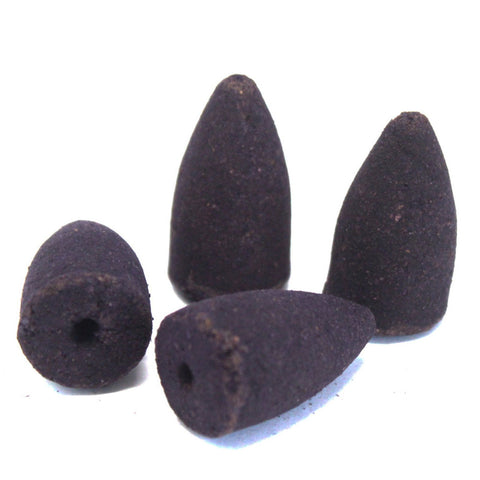 Aromatica Backflow Incense Cones, Nag Champa, dark cones shown loose on a white background