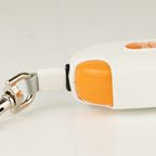 Close-up of the orange button and clip on the Pocket Pod lead