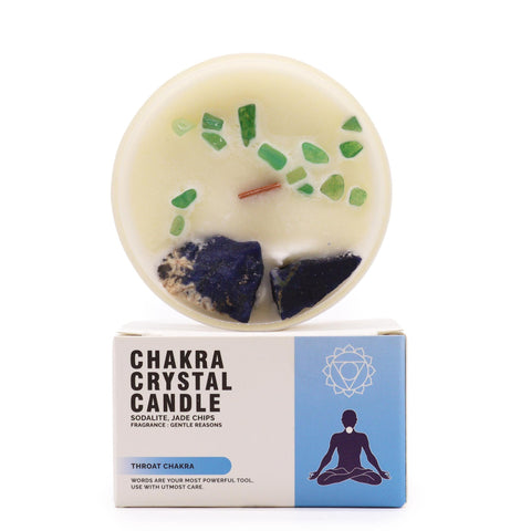 Throat Chakra Crystal Candle with sodalite and jade chips on top, standing above its box