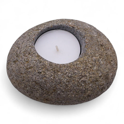 Natural Riverstone Candle Holder, Single Nightlight, rounded grey-brown stone with a white candle, angled view