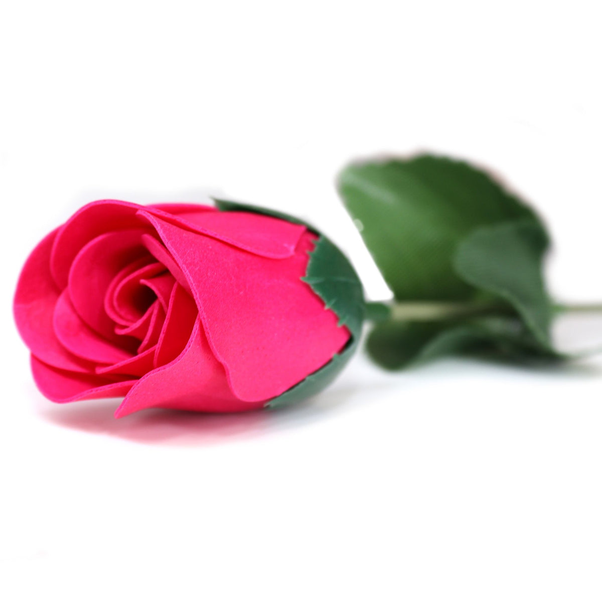 Soap Flower, Small Pink Rose, vivid pink rose with green leaves, shown close up from the side