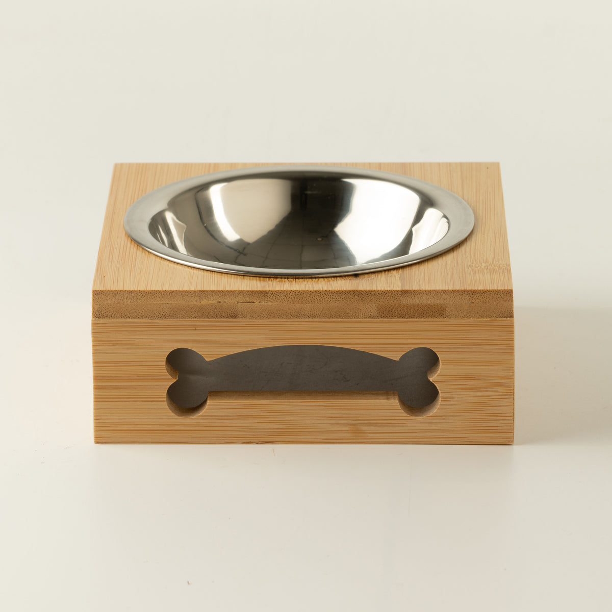 Front view of the PAW bowl in its wooden stand