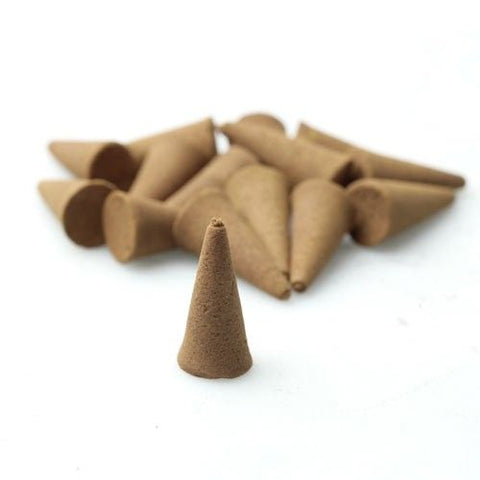 Raw Incense Cones, 5kg pack, one brown cone standing in front of several cones on a white surface