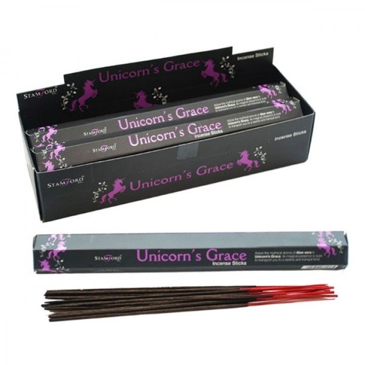 Unicorn's Grace Incense Sticks in an open black box, with a closed pack and loose dark sticks